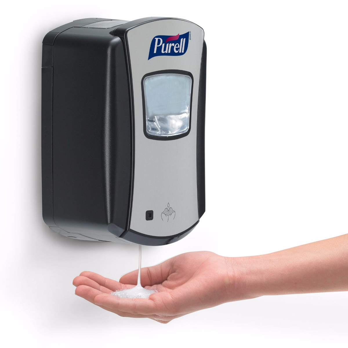 image of Purell wall dispenser with hand underneath